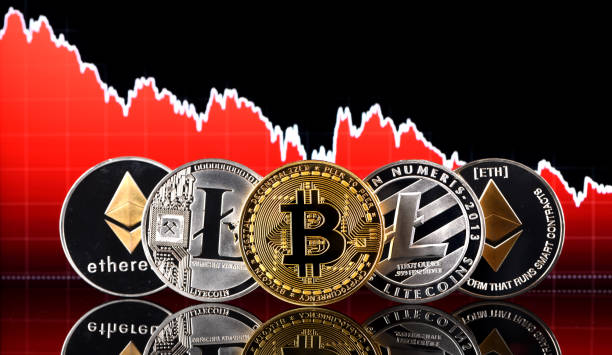 Crypto currency İstanbul, Turkey - January 14, 2018: Close up shot of crypto currency memorial coins on a financial chart. Bitcoin, Litecoin and Ethereum are crypto currencies and a worldwide payment systems. litecoin payment stock pictures, royalty-free photos & images