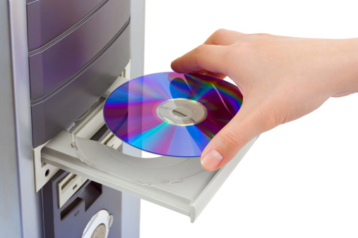 hand-and-computer-cdrom-picture-id?k=&m=&s=a&w=&h=StX-yULscLtdnNKXKADwyEgWzDaublnVUE=