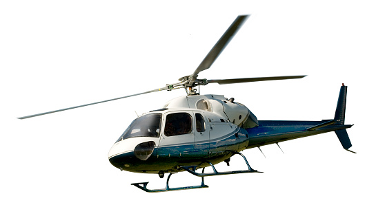 helicopter-in-flight-isolated-against-white-picture-id485462644