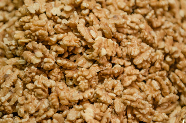 Closeup of big walnuts pile. walnut as background