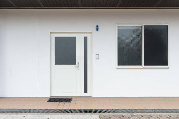 istock sidewalk by street wall & door 1000016398
