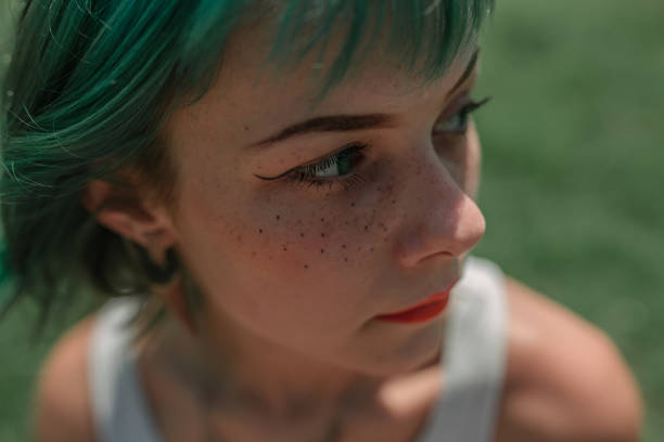istock Girl with green hair 1000036896