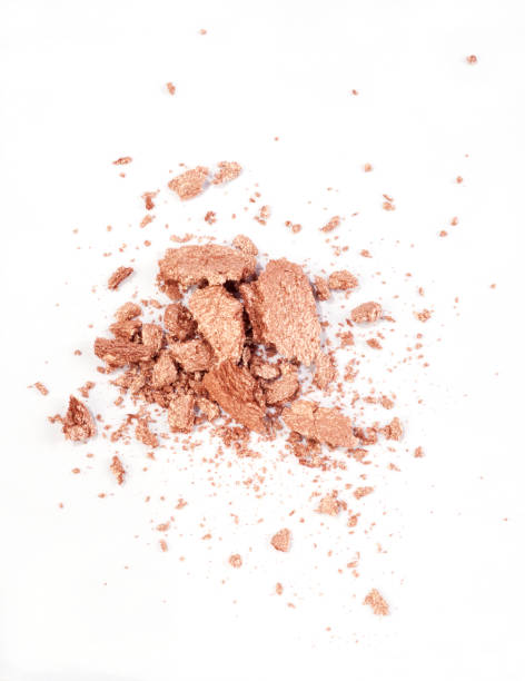istock golden eyeshadow isolated on white 1000065830