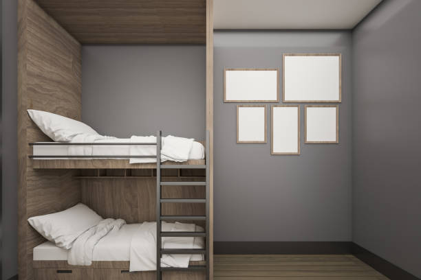 istock Wooden Buck bed with mock up poster frame , 3d Rendering 1000082640