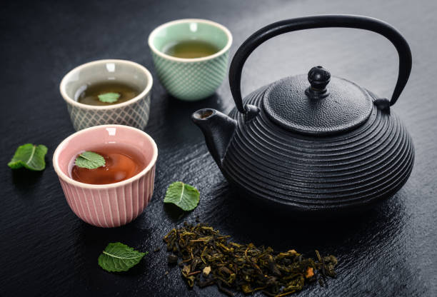 istock Green tea in cast-iron teapot 1000083474