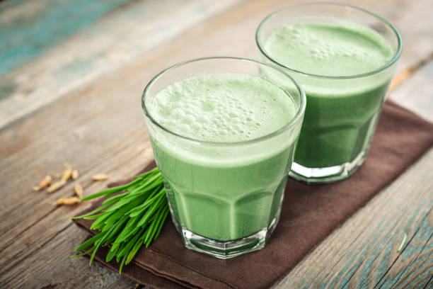 istock Two green barley grass shots 1000098868