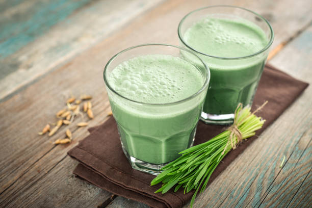 istock Two green barley grass shots 1000098870