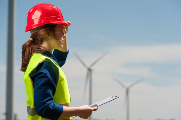 istock Concept of engineers and windmills 1000127286