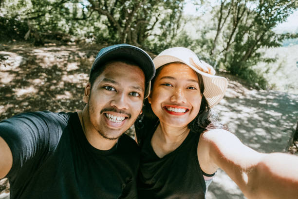 istock Young Couple Pose For Holiday Selfie, in Bali 1000132956