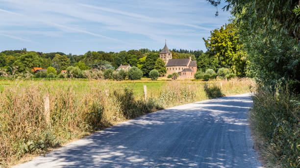 istock Dutch landscape with an ancient Roman church 1000152392