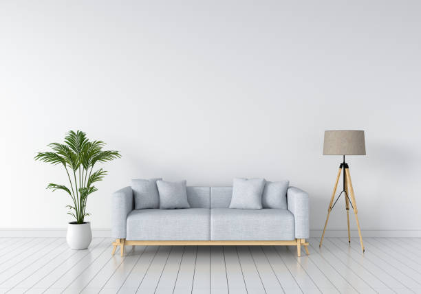 istock grey sofa and lamp in white living room, 3D rendering 1000158296
