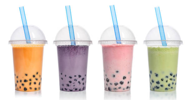 Various Bubble Tea Various Bubble Tea in a plastic cups with drink straws isolated on white background. Take away drinks concept. bubble tea photos stock pictures, royalty-free photos & images