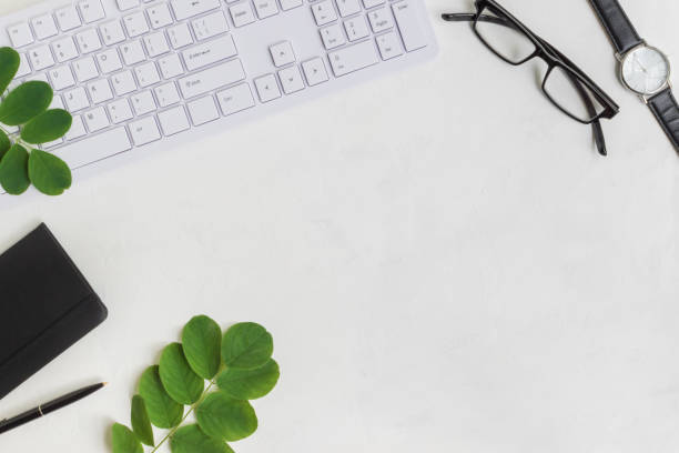 istock Blogger or freelancer workspace with notebook and green leaves 1000168732