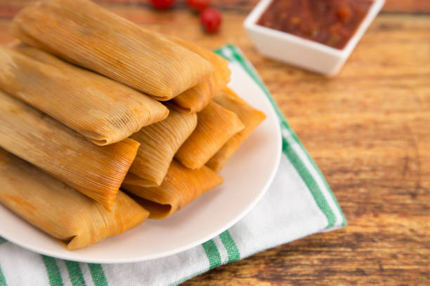 istock Plate Filled with Homemade Tamales Ready for Dinner 1000202090