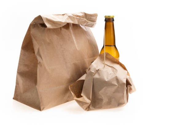istock Brown bag lunch with sandwich and soda bottle 1000238812