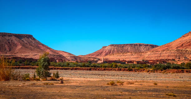 istock Desert road with Atlas Mountains, Morocco 1000242332
