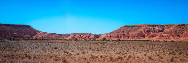 istock Desert road with Atlas Mountains, Morocco 1000242428