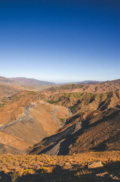 istock Desert road with Atlas Mountains, Morocco 1000242486