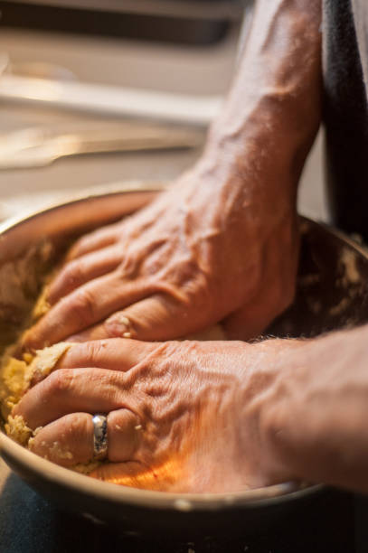 istock A man's hands preparing pastry in a bowl 1000251044