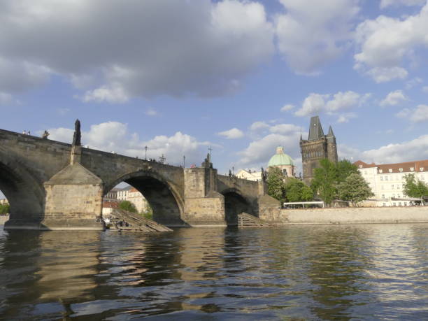 istock harles Bridge. The Vltava River. View on Vltava river and Charles bridge Beautiful view of Prague. 1000254970