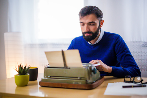 Someone Using Typewriter Man Using Retro Typewriter Stock Photo - Download Image Now ...