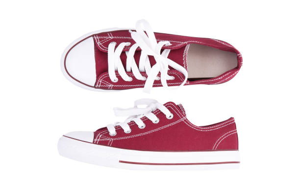 istock Red sneakers top view isolated on white background 1000267146