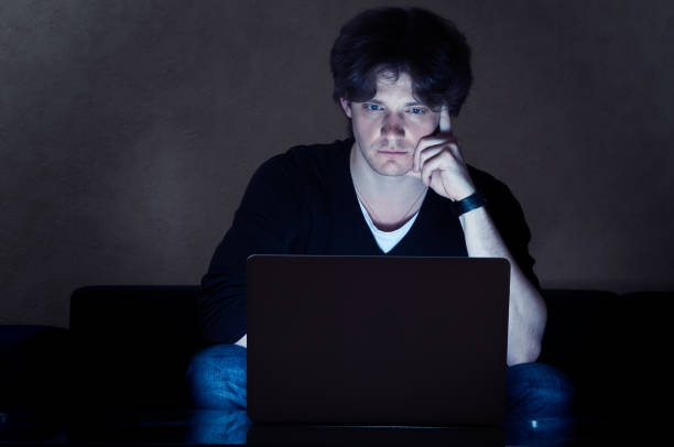 istock Man in front of laptop, portrait 1000274820