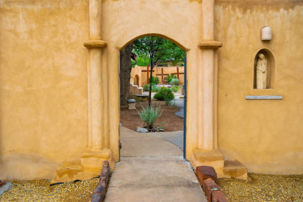 istock Adobe Church Wall, Door and Cross 1000291804