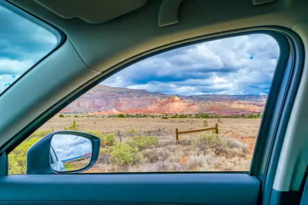 Scenic landscape through car window near Ghost Ranch.