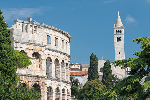 The famous Pula Arena Amphitheatre with Sveti Antun Church, Croatia. Converted from RAW.