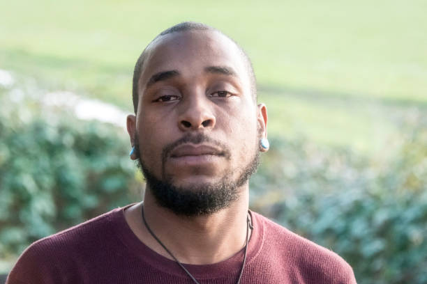 istock Serious African descent man looking at the camera 1000324832