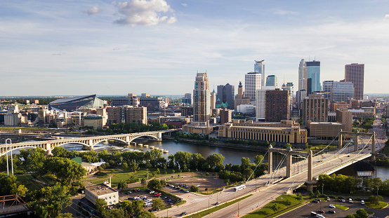The late afternoon sun shines in this aerial view over the Minneapolis skyline.