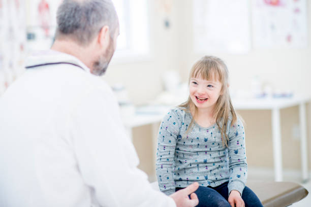 istock A girl with a doctor 1000387736