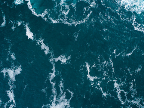 Close up photograph of a wave captured from a drone.