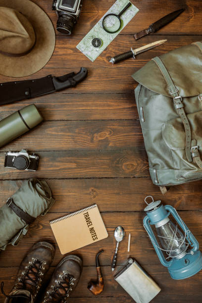 istock Camping gear on wooden floor background 1000401440