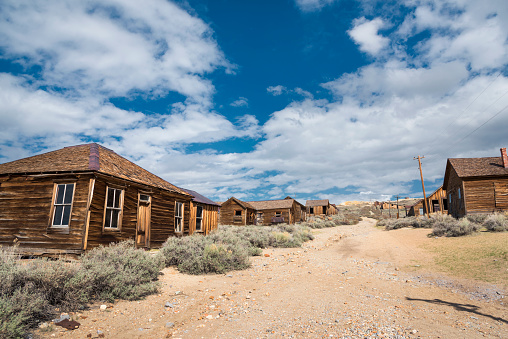 Rustic old building with weathered wood and blue sky