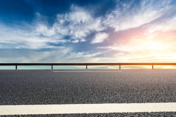 istock Beautiful sky cloud and asphalt road landscape 1000488904