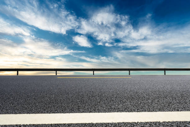 istock Beautiful sky cloud and asphalt road landscape 1000496462