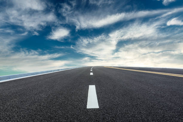 istock Beautiful sky cloud and asphalt road landscape 1000496996
