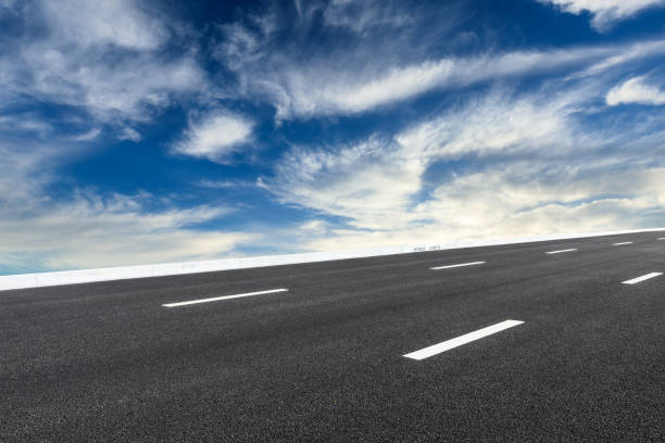 istock Beautiful sky cloud and asphalt road landscape 1000500926