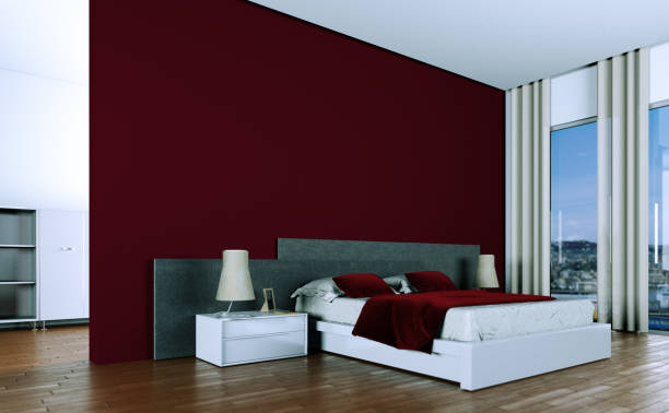 istock modern bedroom with red wall and modern decor 1000501434