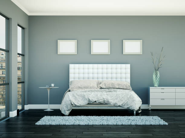 istock modern bedroom with grey wall and modern decor 1000505874
