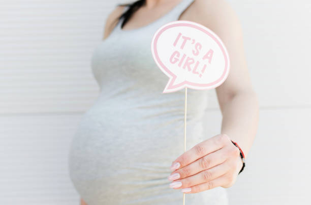 istock It's a girl annoucement with prop 1000507980