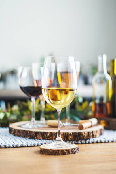 istock Wine tasting theme with various bottles of wine and glasses 1000521408