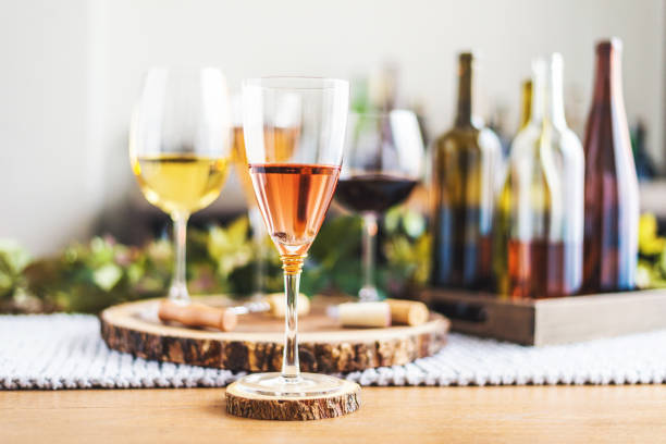 istock Wine tasting theme with various bottles of wine and glasses 1000521410