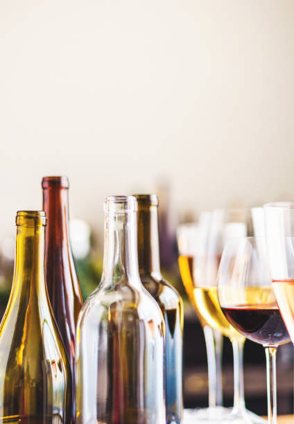 istock Wine tasting theme with various bottles of wine and glasses 1000521556