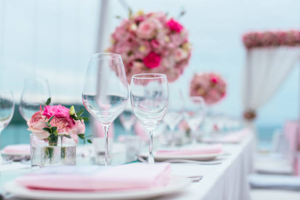 istock Table setting at a luxury wedding and Beautiful flowers on the table. 1000564408