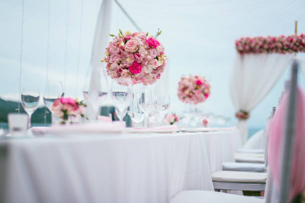istock Table setting at a luxury wedding and Beautiful flowers on the table. 1000564450