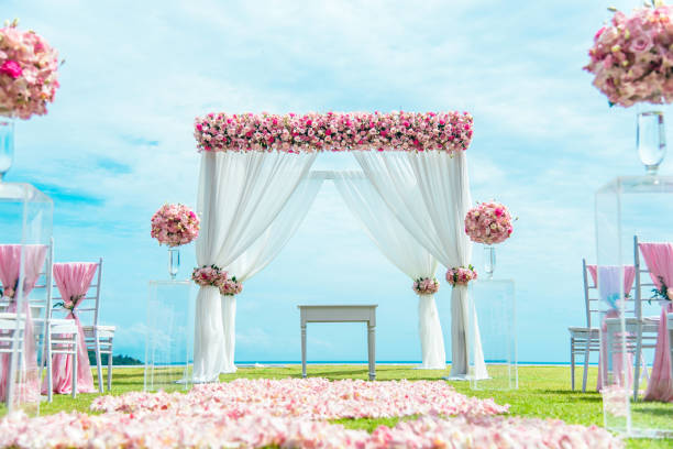 istock Romantic wedding ceremony on the lawn Sea view. 1000564578