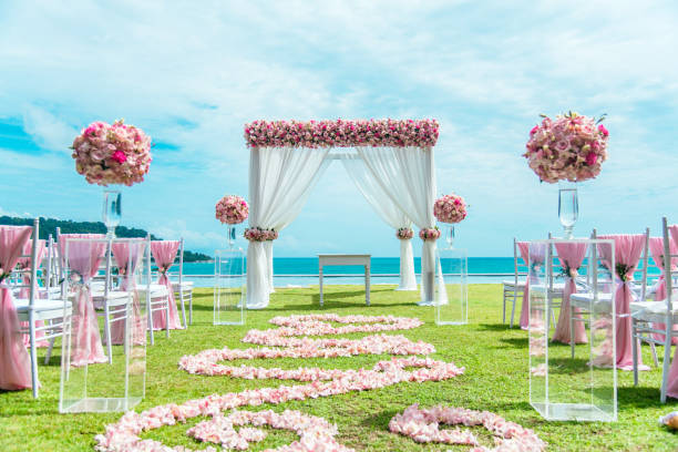 istock Romantic wedding ceremony on the lawn Sea view. 1000564648